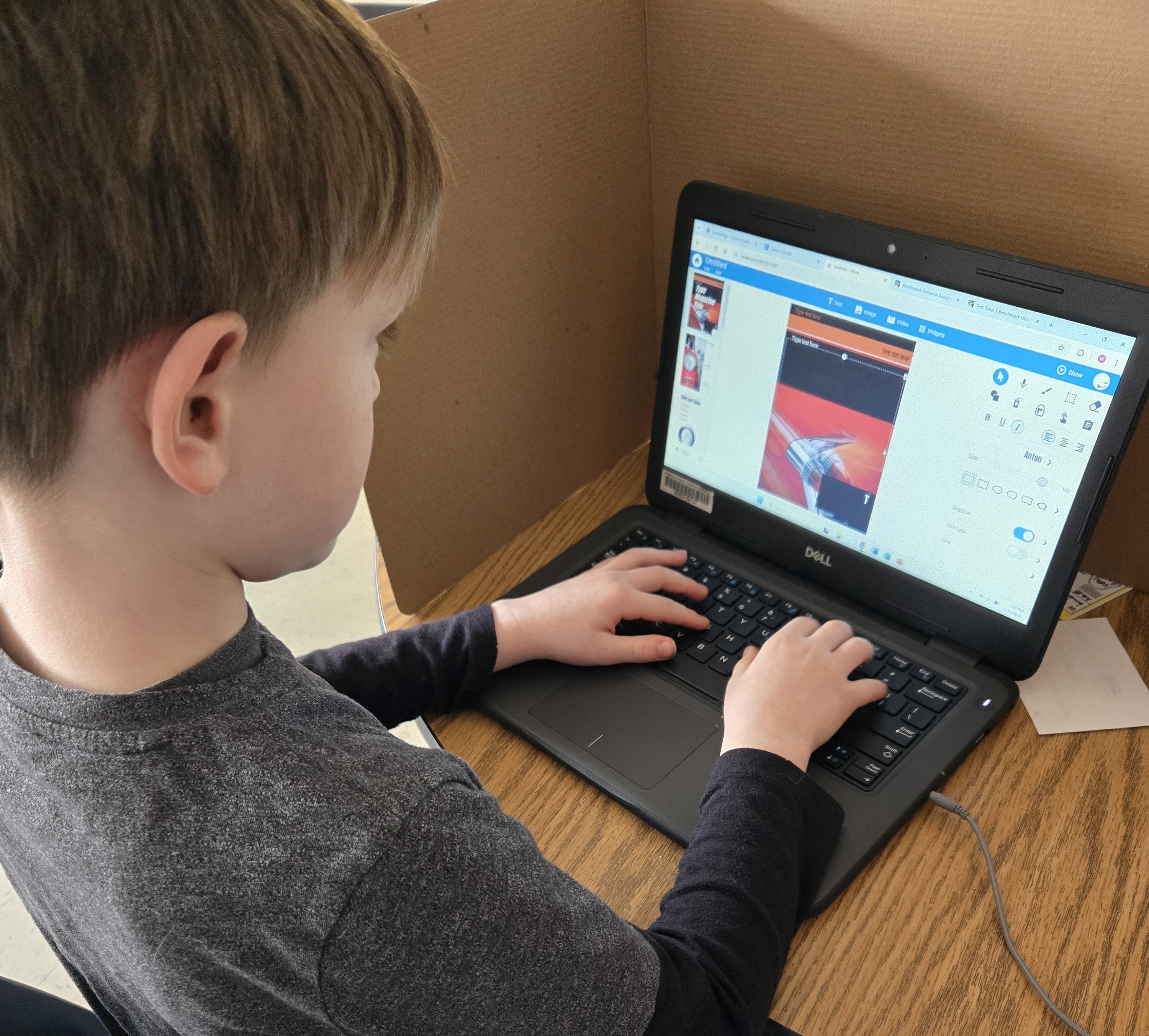 student on wixie on computer